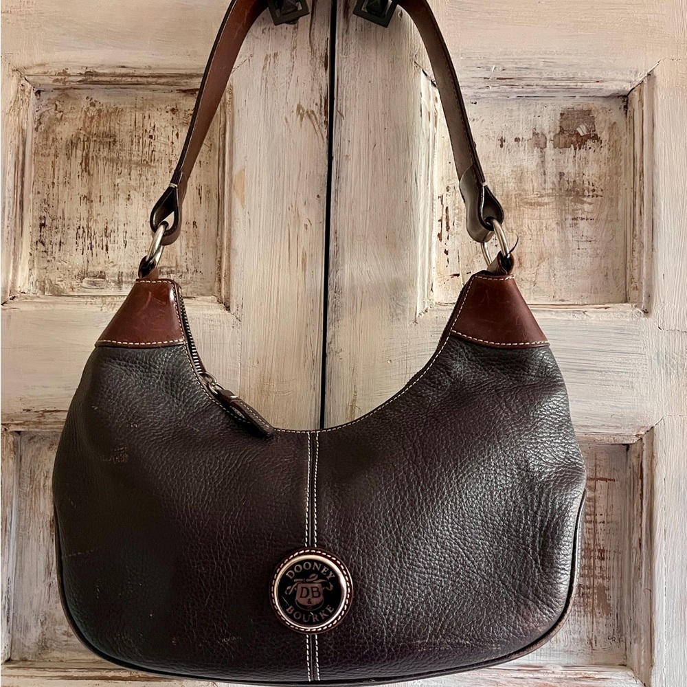 Dooney & Bourke purse.  Dark brown. Good used condition.